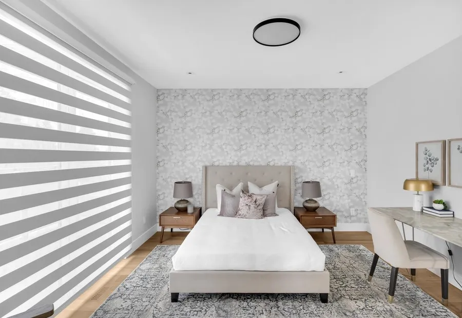 Feature wall with a textured covering framing a Calgary living space